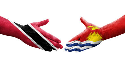 Handshake between Kiribati and Trinidad Tobago flags painted on hands, isolated transparent image.