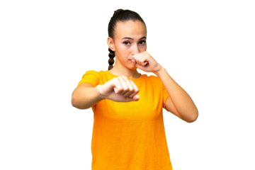 Young Arab woman over isolated background with fighting gesture