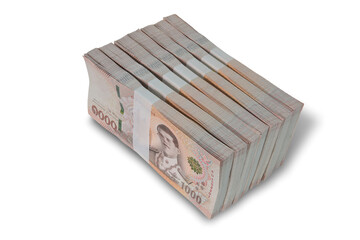 Thai baht, paper bank, price of one thousand, 100 per tie, stacked 7 sets isolated on white background. This has clipping path.