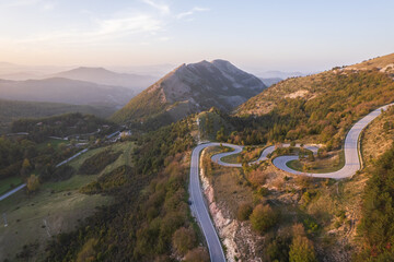 Aerial view of curvy road on monte Nerone slope in Marche region in Italy