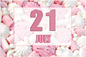 calendar date on the background of white and pink marshmallows. July 21 is the twenty first day of the month