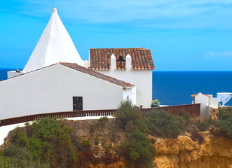 Wedding Chapel Nossa Senhora da Rocha or our lady of the rock at the Algarve coast of Portugal