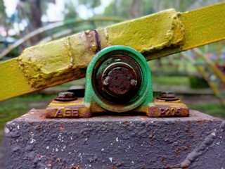 Fototapeta na wymiar rusty children's toy seesaw pulley