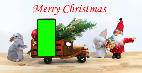 Christmas pedestal with phone chromakey still life with a Christmas card with a dwarf, snowman....