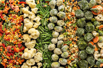 Frozen vegetable mix, frozen green beans and broccoli, corn and carrots, brussels sprouts and cauliflower, peas and bell peppers, eggplant and zucchini, top view