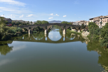 Puente la Reina, Spain - 31 Aug, 2022: Arches of the roman Puente la Reina foot bridge, Navarre, Spain