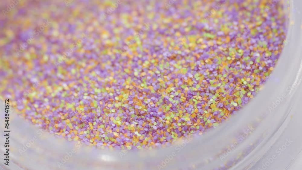 Poster decorative sequins in a jar rotate in a circle