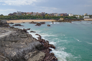 Santander, Spain - 31 Oct, 2022: Rock formations on the coast of the Magdalena Peninsula and Playa...