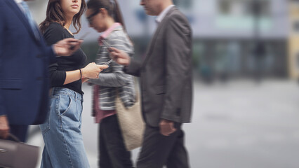 Crowd of people using smartphones