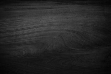 Dark wood texture background. Vintage old black boards hardwood. Pattern wood grain material polished. Wooden floor detailed photo.