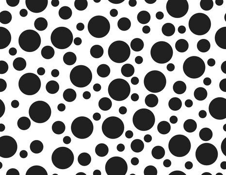 Black and white polka dots on seamless background