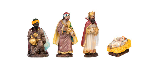 The Christmas magic. Ceramic figure of the wise men with the baby Jesus