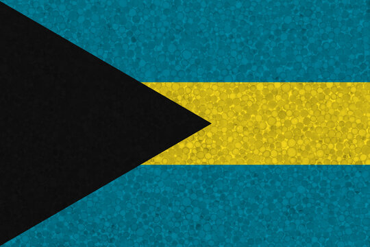 Flag of the Bahamas on styrofoam texture. national flag painted on the surface of plastic foam © Mieszko9