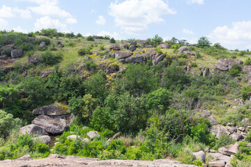 Fototapeta na wymiar View of Arbuzynsky canyon is a canyon near the Trykraty village, on the Arbuzynka river in the Voznesenskyi region of Mykolaiv Oblast of Ukraine