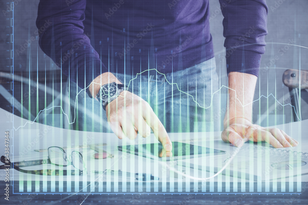 Poster Double exposure of man's hands holding and using a digital device and forex graph drawing. Financial market concept.