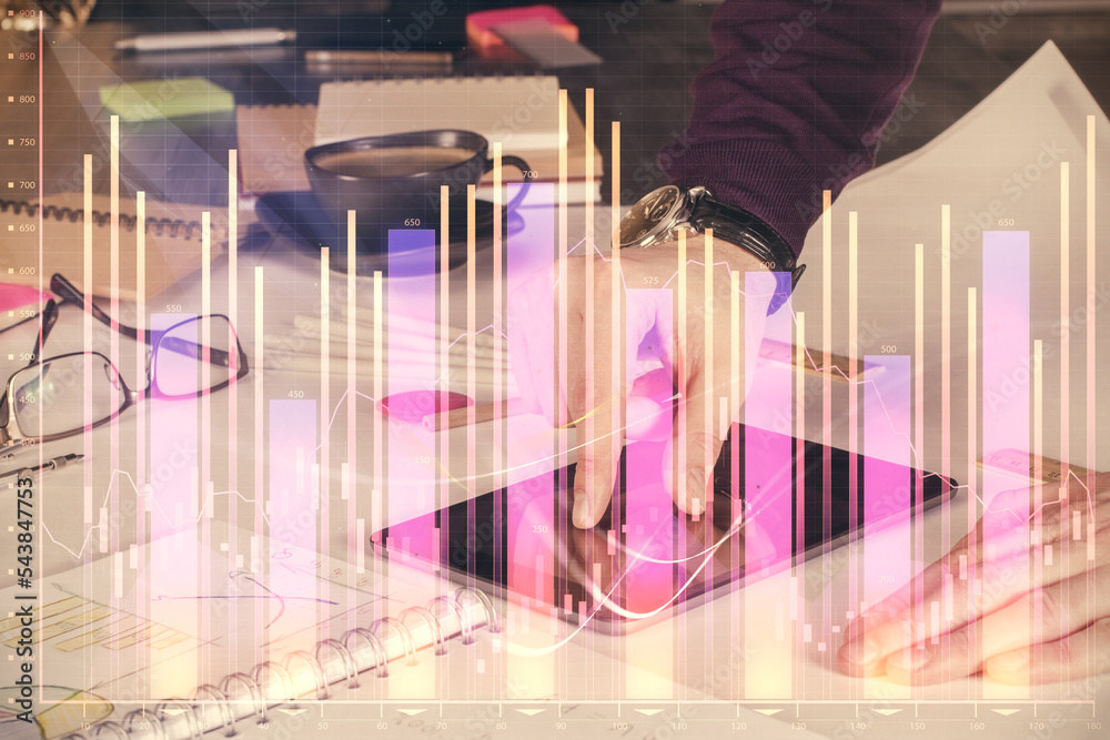 Poster double exposure of man's hands holding and using a digital device and forex graph drawing. financial