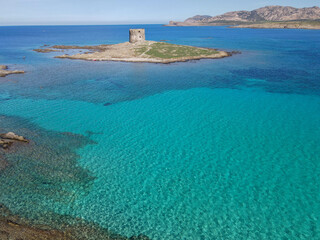 Drone view at the beach of Pelosa at Stintino on Sardinia, Italy