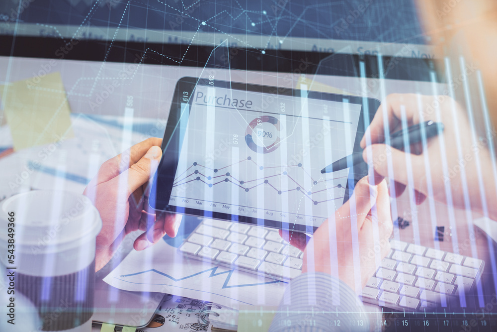 Aufkleber double exposure of man's hands holding and using a phone and financial chart drawing. market analysi