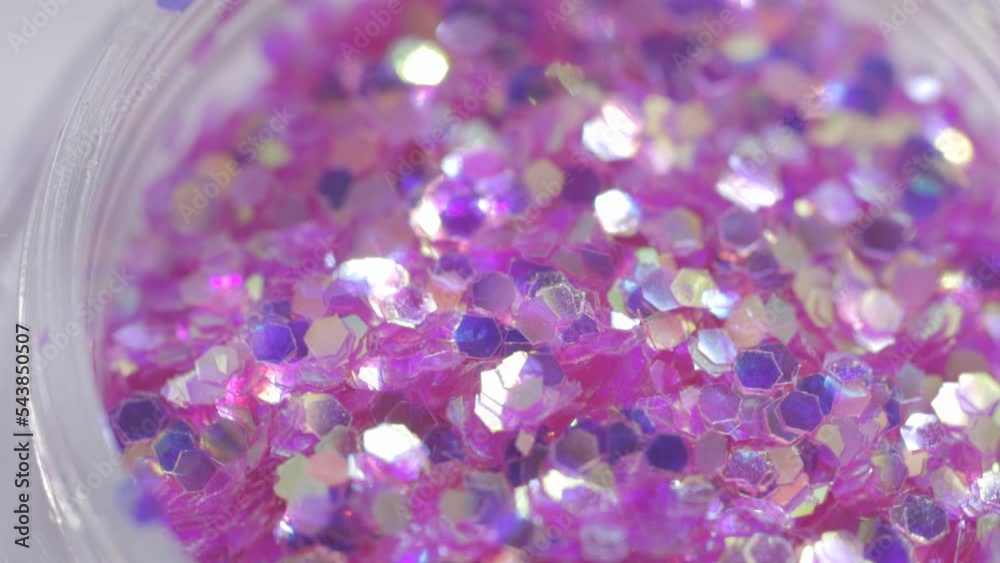Poster decorative sequins in a jar rotate in a circle