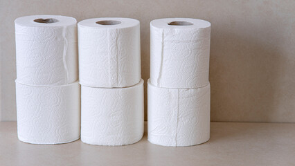 rolls of toilet paper on grunge background