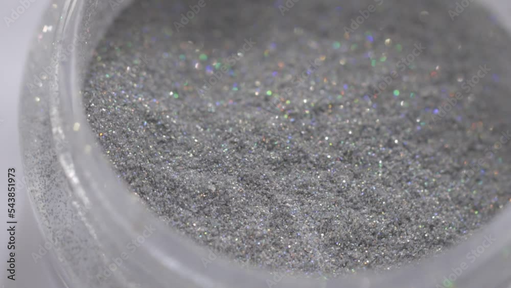 Poster decorative sequins in a jar rotate in a circle