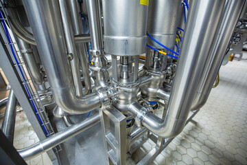 The process pipe valve is stainless at the in-process area of the pipeline flowing stainless food...