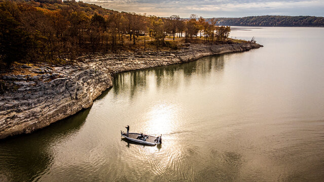 Fall bass fisherman fishing on lake Tenkiller Oklahoma 