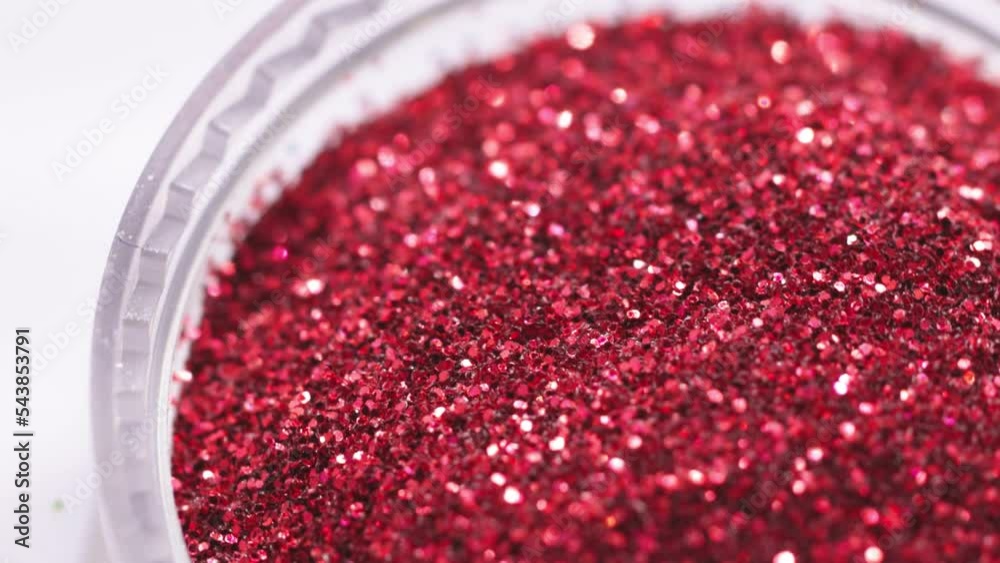 Poster decorative sequins in a jar rotate in a circle