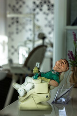 dentist office with dentist equipment and teeth mold