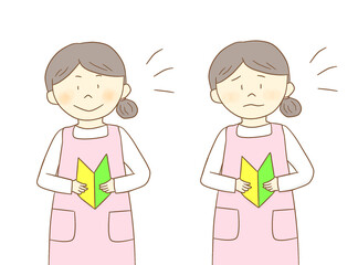 初心者マークを持つ介護士