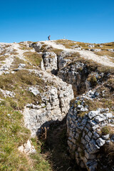 Fototapeta na wymiar Remains of military trenches on Mount Piano in the Dolomite Alps, built during the First World War