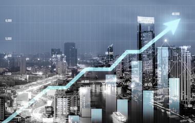 Financial graphs and digital indicators overlap with modernistic urban area, skyscrabber for stock market business concept. Double exposure.