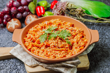 Kimchibokkeumbap, Korean Kimchi Fried Rice : Rice fried with finely chopped kimchi. Beef, pork, onions, green onions, and other vegetables may be added according to taste.