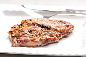pork cutlet on white plate