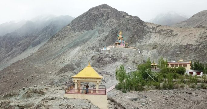 Lord Buddha statue against blue sky, Diskit Monastery in Nubra Valley, Leh, Ladakh