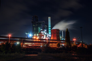 Steel industry of Duisburg, North Rhine-Westphalia, Ruhr, Germany. Smoke emissions from cooling...