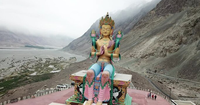 Lord Buddha statue against blue sky, Diskit Monastery in Nubra Valley, Leh, Ladakh