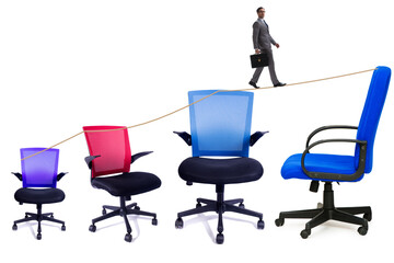 Promotion concept with businessman and chairs