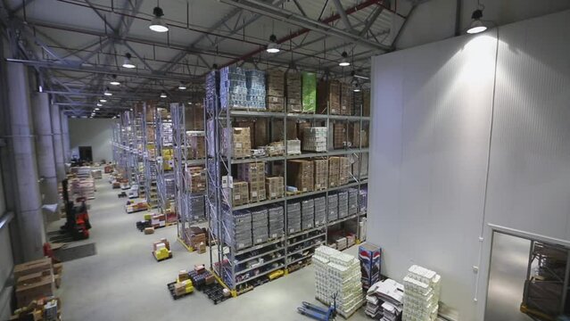 Large Distribution Centre Fulfilment Warehouse Interior Going down