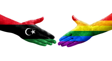 Handshake between LGBT and Libya flags painted on hands, isolated transparent image.