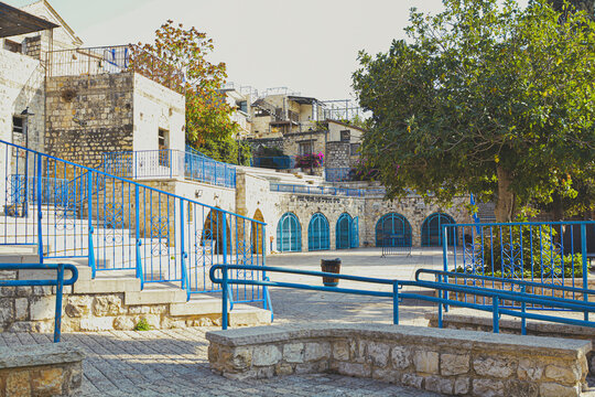 Charming streets of israel  Crete. Street in the old town of  Beautiful street in Safed, Israel, Summer landscape. Travel and vacation View of an alley in the Artists Quarter of the old city of Safed