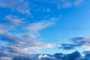 Fototapeta na wymiar Beautiful cumulus clouds in the light blue sky