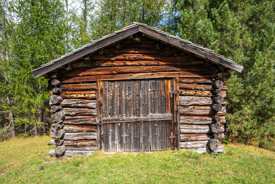 Typical alp with a hay shed in the Dolomite Alps in the Fanes Sennes Prags Nature Park, South Tirol