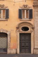 Fototapeta na wymiar Rome Via delle Botteghe Oscure Street Old Traditional Building Facade Close Up, Italy