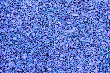 Stones background. Colorful, blue pebbles. Delicate wallpaper.