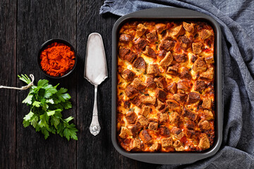 Scalloped Chicken Casserole topped with croutons - obrazy, fototapety, plakaty