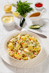 shout hallelujah potato salad in white bowl