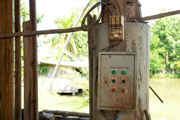 old circuit breakers  and Electrical control cabinet in the old factory