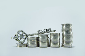 Key on stacked coins