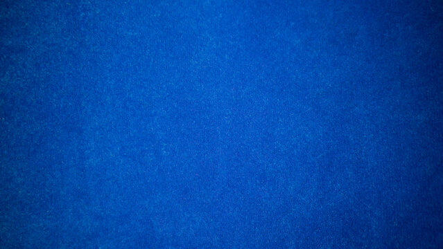 blue velvet fabric texture used as background. Empty blue fabric background of soft and smooth textile material. There is space for text.